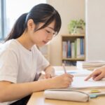 1対1指導で英語問題に取り組む中学生
